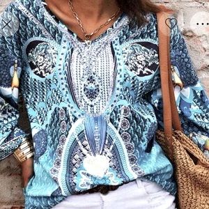 Women’s large long sleeve boho style shirt.